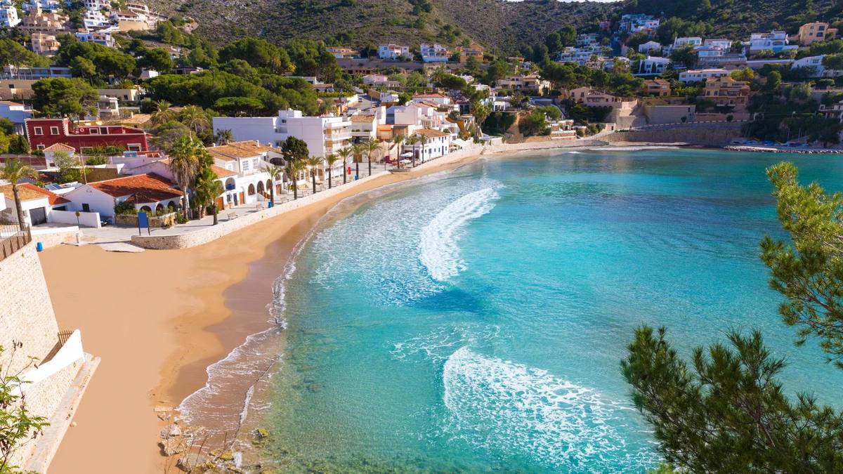 Original version of Moraira Beach Spain before and after enhancement